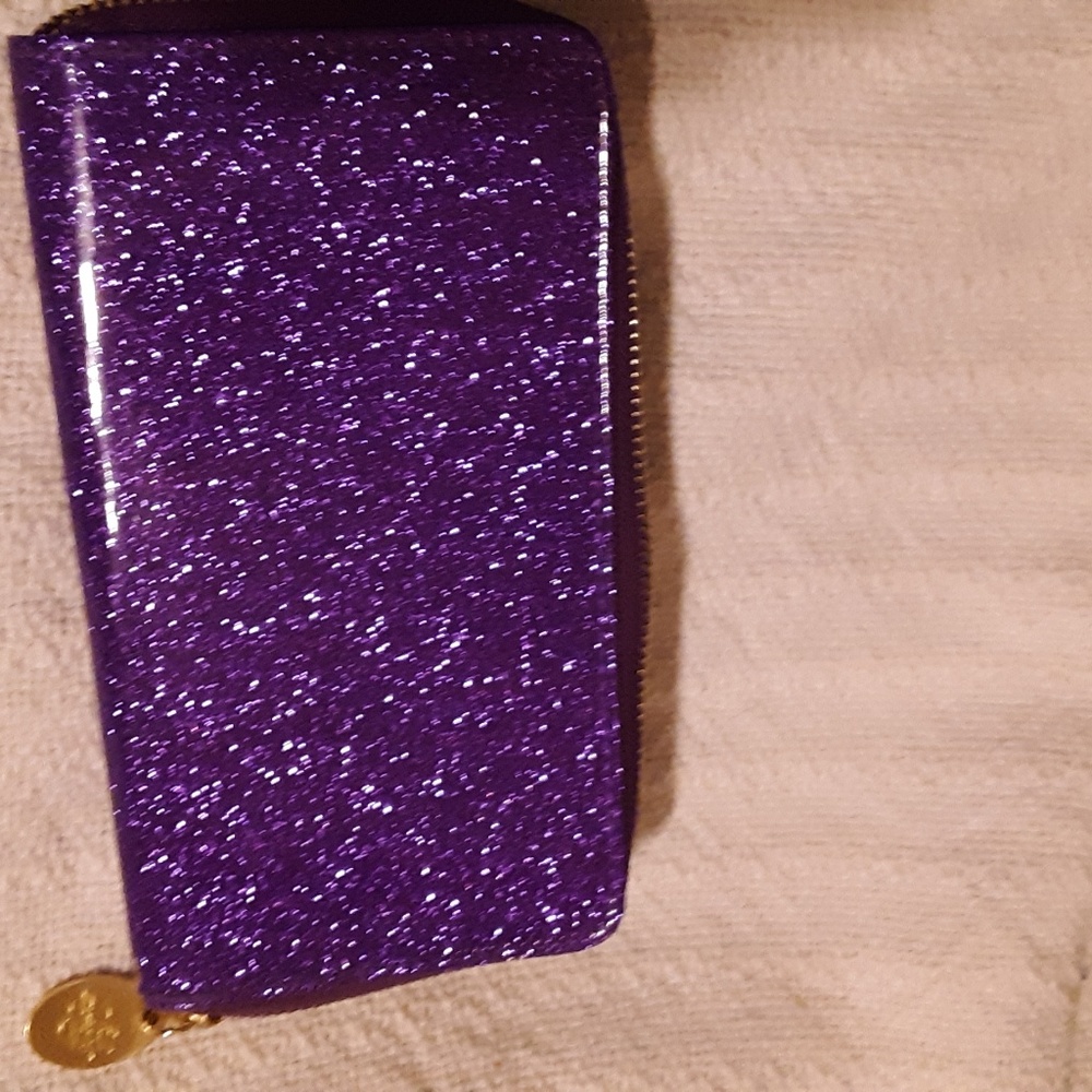 Wallet by Kirk's Folley. Brand new never use. Nice